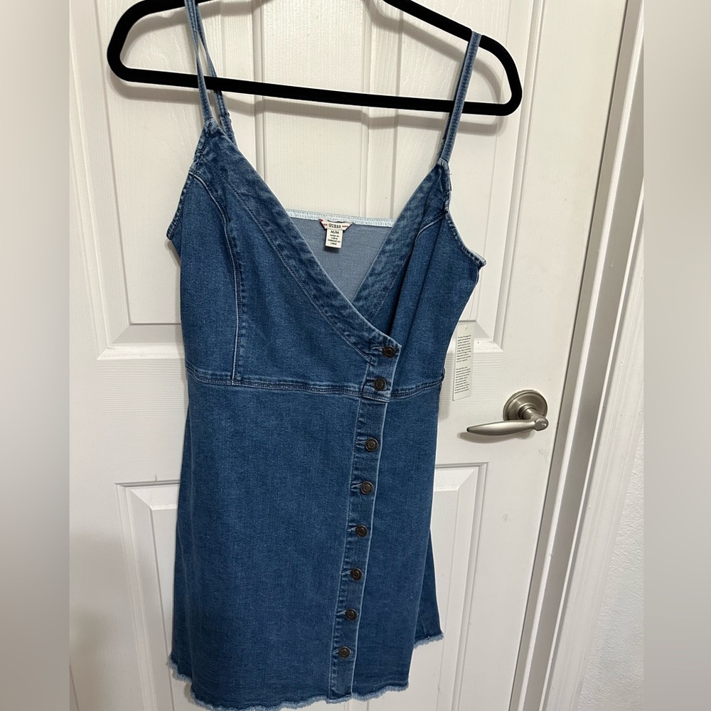 Mini jean dress size medium with tags